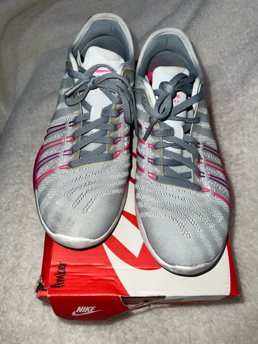 Nike Free TR 6 women's training shoes in a grey and pink colorway